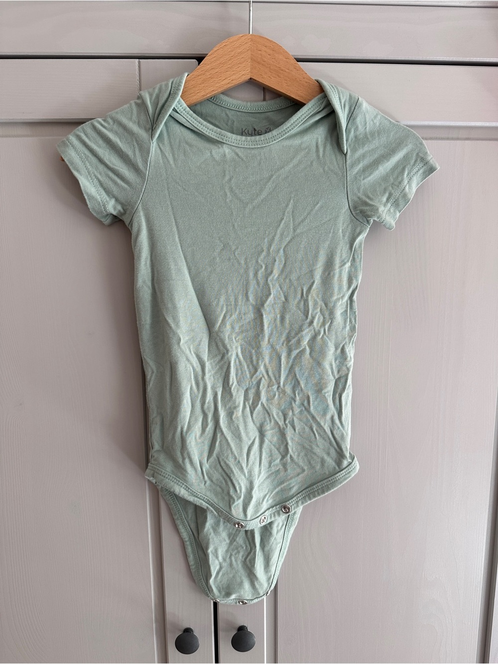 Kyte Baby bodysuit in Sage 12-18m